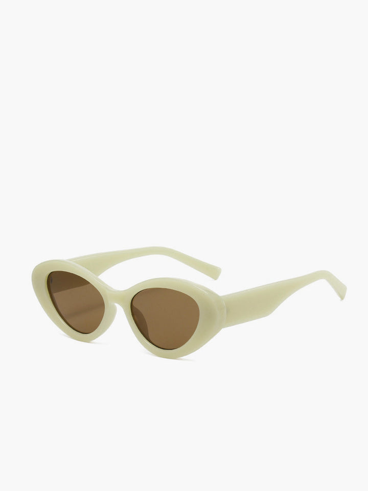 Sunglasses, oval cat eye silhouette in apricot, plastic, ladies