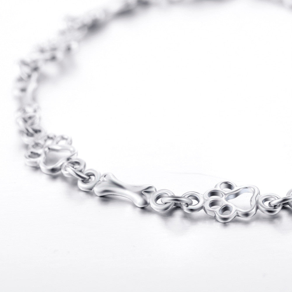 Solana – Paw and Bone Chain Bracelet with Quiet Charm