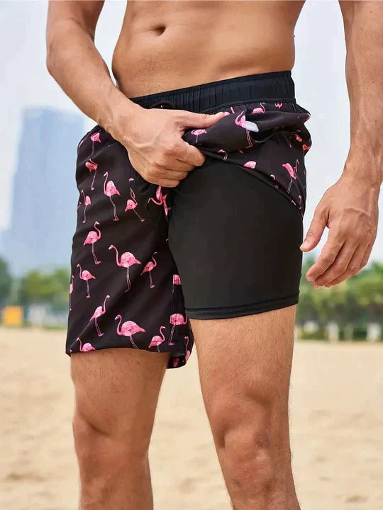 Bailey | Men's Tropical Print Swim Shorts, Drawstring Mid-Thigh Shorts | The Shrader Sisters | Black flamingo