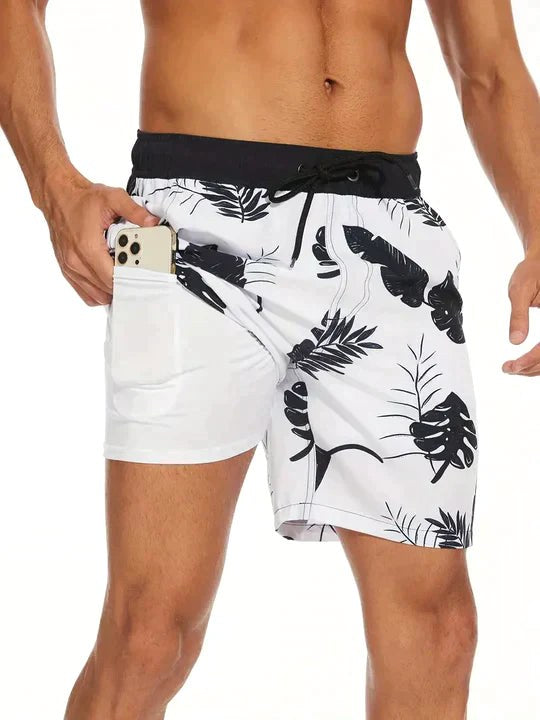 Bailey | Men's Tropical Print Swim Shorts, Drawstring Mid-Thigh Shorts | The Shrader Sisters | Monochrome flora