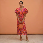 Kelsey | Women's V-Neckline Dress with Puffed Sleeves, Elegant Day Dress | The Shrader Sisters | Naranja/Violeta