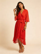 Paige | Women's Flowy Midi Wrap Dress with Tie Waist, V-Neck Midi Dress | The Shrader Sisters | Oranje