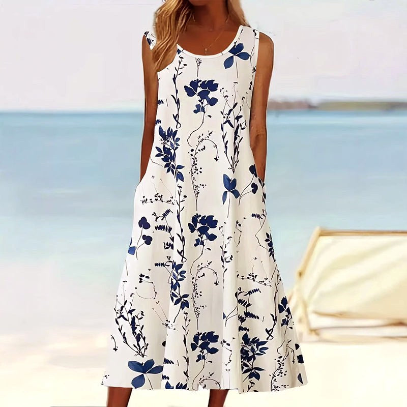 Tegan | Women's Sleeveless A-Line Midi Dress, Floral Print Midi Dress | The Shrader Sisters | Blauw